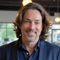 Blue-Shirt-Cropped Headshot of of Corey Clements